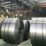 Stainless steel coils with steel strapping in a storage hall, UZX-942
